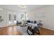 Cozy living room with a modern sofa, decorative pillows, and stylish lighting at 1613 Sapphire Star Dr, Oviedo, FL 32765
