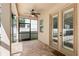Relaxing covered patio with brick flooring, ceiling fan and access to yard at 1613 Sapphire Star Dr, Oviedo, FL 32765