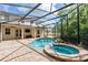 Backyard pool and spa with screened enclosure at 1613 Sapphire Star Dr, Oviedo, FL 32765
