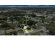 Aerial view shows property lines, neighborhood streets, and surrounding greenery at 1725 Marcia Dr, Orlando, FL 32807