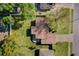 This is an aerial shot of a home featuring a well-maintained roof and manicured backyard at 1725 Marcia Dr, Orlando, FL 32807