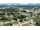 Aerial view of a residential neighborhood with tree-lined streets and well-maintained homes at 1725 Marcia Dr, Orlando, FL 32807