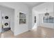 Open space with washer/dryer hookups adjacent to dining room in the house at 1725 Marcia Dr, Orlando, FL 32807