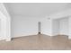 Spacious living room with neutral tile flooring, lots of natural light, and an open floor plan at 1725 Marcia Dr, Orlando, FL 32807