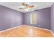 Bedroom featuring a ceiling fan and window providing natural light at 1802 Hagen Ct, St Cloud, FL 34771