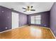 Bedroom featuring a ceiling fan and window providing natural light at 1802 Hagen Ct, St Cloud, FL 34771