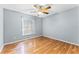 Bedroom featuring a ceiling fan and window providing natural light at 1802 Hagen Ct, St Cloud, FL 34771