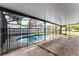 Inviting screened-in pool with a safety fence, providing a secure and enjoyable outdoor space at 1802 Hagen Ct, St Cloud, FL 34771