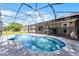 Beautiful pool area with full screen enclosure, perfect for relaxing and entertaining outdoors at 1802 Hagen Ct, St Cloud, FL 34771