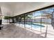 Inviting screened-in pool with a safety fence, providing a secure and enjoyable outdoor space at 1802 Hagen Ct, St Cloud, FL 34771