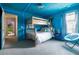 The themed bedroom offers bunk beds and muraled walls for a unique and playful atmosphere at 1864 Nice Ct, Kissimmee, FL 34747