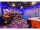 Amazing game room with basketball game, air hockey, and driving simulator at 1864 Nice Ct, Kissimmee, FL 34747