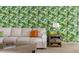 Cozy living room featuring botanical wallpaper, and comfortable seating at 1864 Nice Ct, Kissimmee, FL 34747