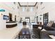 Bright and welcoming lobby with high ceilings, modern furniture, a reception desk and ample seating at 1864 Nice Ct, Kissimmee, FL 34747