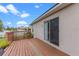 The backyard features a deck perfect for entertaining and enjoying the outdoors at 1942 N Portillo Dr, Deltona, FL 32738