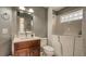 Well-lit bathroom features a walk-in tub, vanity with marble top, and neutral wall colors at 203 Red Bud Ct, Lake Mary, FL 32746