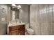 Functional bathroom with a single vanity, toilet, and enclosed shower with leaf curtain at 203 Red Bud Ct, Lake Mary, FL 32746