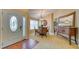 Inviting foyer and dining area with natural light, open layout, and stylish furnishings at 203 Red Bud Ct, Lake Mary, FL 32746