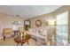 Comfortable living area featuring neutral decor, soft lighting, and a relaxing atmosphere at 203 Red Bud Ct, Lake Mary, FL 32746
