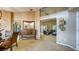 Bright, airy living room with neutral paint, high ceilings, and seamless flow into adjoining rooms at 203 Red Bud Ct, Lake Mary, FL 32746