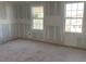Unfinished bedroom with two windows bringing in natural light at 2286 Broadbrook Dr, St Cloud, FL 34771