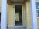 A close-up of the open doorway shows the interior of the home at 2286 Broadbrook Dr, St Cloud, FL 34771