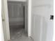 Unfinished hallway displaying drywall and modern electrical outlets at 2286 Broadbrook Dr, St Cloud, FL 34771