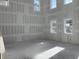 Large unfinished room with multiple windows, ready for customization at 2286 Broadbrook Dr, St Cloud, FL 34771