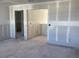Unfinished living room with multiple doorways at 2286 Broadbrook Dr, St Cloud, FL 34771