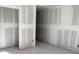 Spacious unfinished living room with open doorways at 2286 Broadbrook Dr, St Cloud, FL 34771