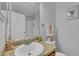 Bright bathroom featuring a vanity with plenty of counter space, plus shower and tub at 2914 Clarabelle Ct, Kissimmee, FL 34743