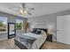 Calm main bedroom featuring a large window that brings in natural light at 2914 Clarabelle Ct, Kissimmee, FL 34743