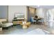 Inviting living room with modern decor, a round coffee table, and stylish accents at 2915 Canary Ave, Davenport, FL 33837