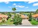 This home has great curb appeal with a well manicured lawn, mature trees, and a three car garage at 313 Sorrento Rd, Poinciana, FL 34759