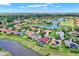 Spacious golf community with a beautiful lake, well-maintained green spaces, and lovely single-Gathering homes at 313 Sorrento Rd, Poinciana, FL 34759