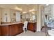 Bathroom with double vanity, granite counters, and decorative accents at 313 Sorrento Rd, Poinciana, FL 34759