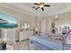 Bright main bedroom with a ceiling fan and plenty of space, creating a relaxing retreat at 313 Sorrento Rd, Poinciana, FL 34759