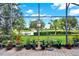 This covered lanai has a beautiful view of the pond and golf course at 313 Sorrento Rd, Poinciana, FL 34759