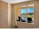 Balcony window view overlooking a scenic pond and a community at 3228 Brasilia Ave, Kissimmee, FL 34747
