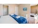 Comfortable bedroom featuring a king bed, and access to a sunny outdoor balcony at 3228 Brasilia Ave, Kissimmee, FL 34747