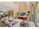 Open-concept living area boasts a spacious layout, modern decor, and plenty of natural light at 3228 Brasilia Ave, Kissimmee, FL 34747
