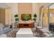 Comfortable living space with contemporary furnishings, tall ceilings, and access to outdoor area at 3228 Brasilia Ave, Kissimmee, FL 34747