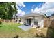 Private backyard with a patio, green lawn and fencing, creating a serene outdoor space at 3536 Moss Pointe Pl, Lake Mary, FL 32746
