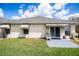 The backyard features a patio, and sliding doors for easy access, perfect for relaxation and entertaining at 3536 Moss Pointe Pl, Lake Mary, FL 32746