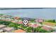 Lakefront property with large backyard, gorgeous water views and mature trees in a gated community at 4120 Juliana Lake Dr, Auburndale, FL 33823