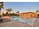 Beautiful community pool with lounge chairs and a clubhouse, creating a resort-like atmosphere for residents at 4120 Juliana Lake Dr, Auburndale, FL 33823