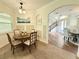 Dining room with a round table and elegant decor at 4120 Juliana Lake Dr, Auburndale, FL 33823