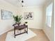 Cozy home office featuring neutral paint, a modern desk, and natural light from a window at 4120 Juliana Lake Dr, Auburndale, FL 33823