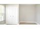 Bedroom featuring a large closet with white bi-fold doors at 4404 Gwyndale Ct, Orlando, FL 32837