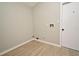Laundry room with light colored flooring and hookups ready for a washer and dryer unit at 4404 Gwyndale Ct, Orlando, FL 32837